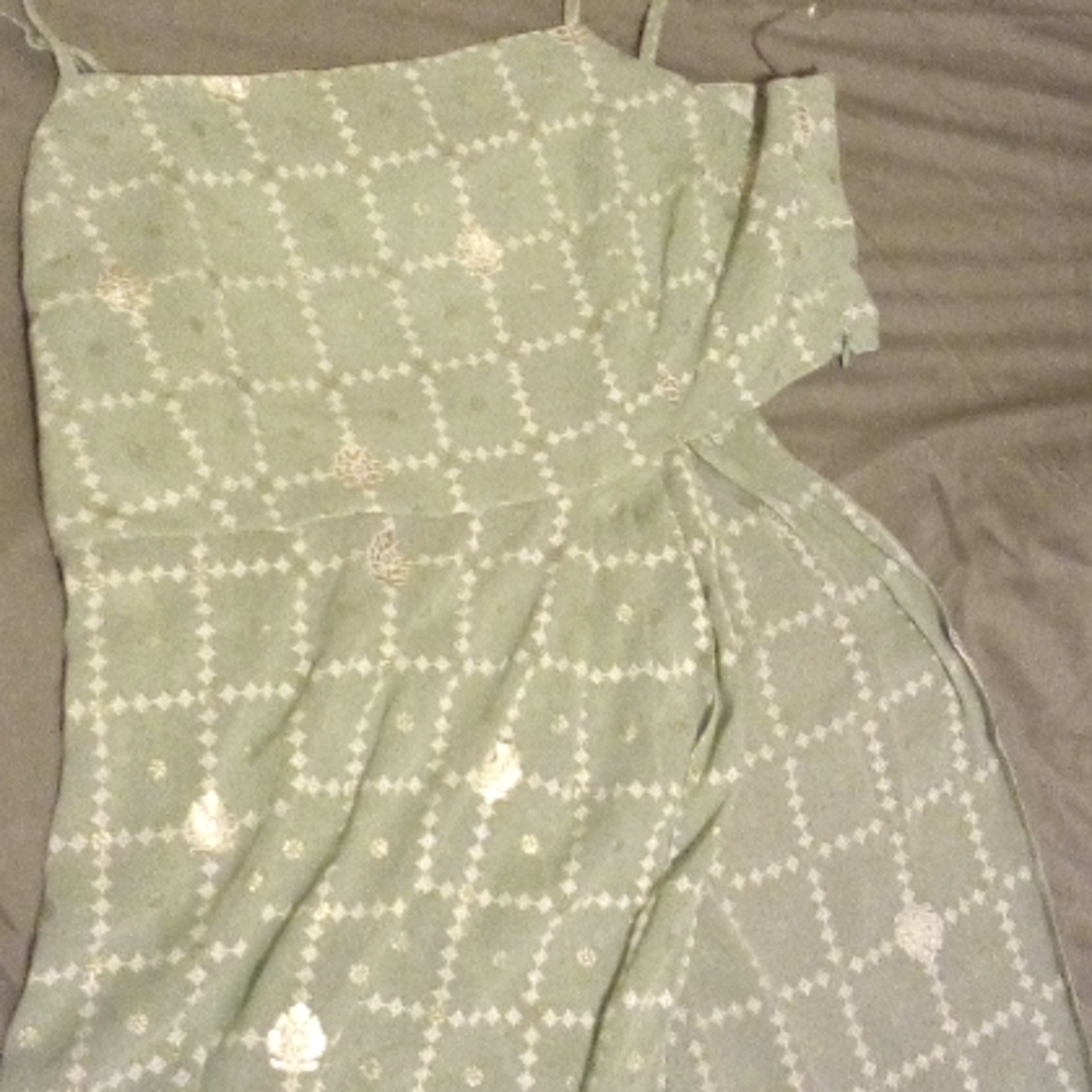 This is a beautiful T-shirt long with an opening for the side